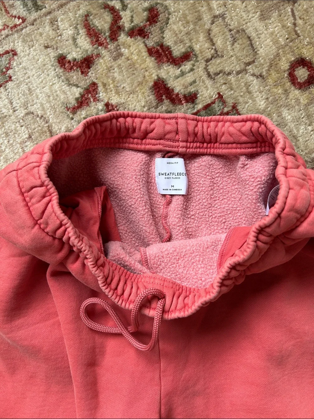 Aritzia Mega fit Cozy Fleece Sweatpants in Coral